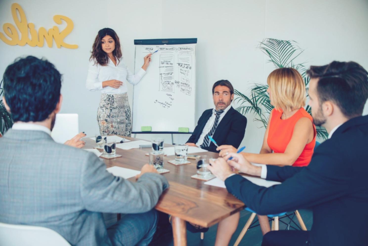 Team collaboration workspace with financial planning materials